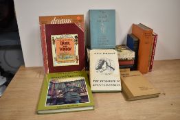A selection of books, including vintage Daily Mail annual for boys and girls and reference books
