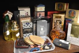 A selection of vintage aftershaves and perfumes comprising of Givenchy Gentleman, Hardy Amies,