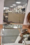 Four vintage British rail mirrors, three having etched initials and one having British rail sign.