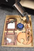 An assortment of African handicrafts including coasters, table wear, toy truck, etc.