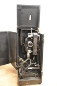 A 1930s Ensign SS300B film projector in case