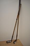 Two hickory shafted HB Simpson golf clubs, having age related wear.