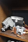 A vintage Canon reflex zoom 8-2 cine camera in case and a Balda Balessa lb F2.8 45mm lens Prontor-