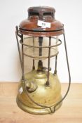 A vintage cast-brass and enamelled Tilley lamp, of traditional design