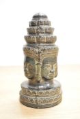 A Thai cast patinated metal depiction of the four faces of Buddha, approx 12.5cm