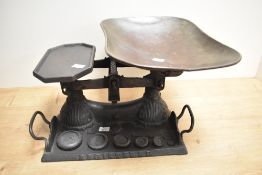A set of Victorian cast-iron 'registered' scales, of traditional design with moulded acanthus