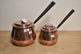 Two mid to late 19th century Benham & Froud (1855-1924) copper pot bellied pans and covers, each
