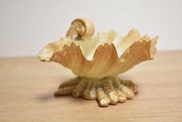 A late Victorian Royal Worcester porcelain blush ivory shell form dish, with gilt embellishments,