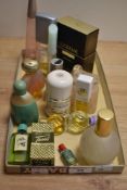 An assorted collection of eau de toilettes and perfumes including Estee Lauder Pure White Linen,
