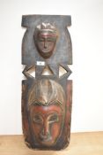An African carved wooden totem mask.