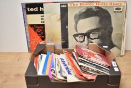 A collection of vintage Lp's and singles including the Buddy Holly story, Elvis and Valdoonican