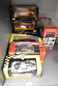 Seven 1:24 scale Die-casts, Rastar BMW X6, Mini Cooper Clubman and Lamborghini, Revell Poreche