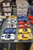Twelve Burago 1:24 scale Die-casts, Ferrari F40, Dodge Viper RT10, Dodge Viper Coupe in red with