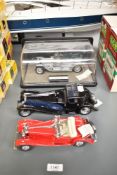 Three Franklin Mint 1:24 scale Die-casts, 1907 Rolls Royce The Silver Ghost in plastic display case,