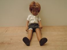 A 1960's/1970's original Sasha Gregor Red Head Doll having jointed body, painted brown eyes and