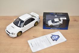 Two Auto Art Die-casts, 1:43 scale Subaru New Age Impreza WRX STI 2001 in display box with