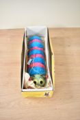 A Pelham Puppet, Caterpillar Standard Puppet, blue and pink body with green head, in original box