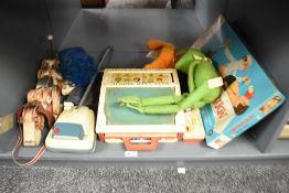 A shelf of mixed Toys, MB Games Operation, Fisher Price Kermit The Frog, School Days Desk, Snoopy