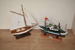 Two wooden model, Sail boat, length 33cm and La Mouette Rieuse Fishing Boat, length 32cm, both on