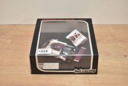 A HPI-Racing 1:43 scale Precision Cast Model, Jaguar XJR-9 (2) 1988 Le Mans, in plastic display