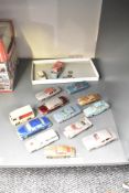 Fourteen Dinky, Corgi and similar playworn Die-casts including James Bond Aston Marin DB5, Ford