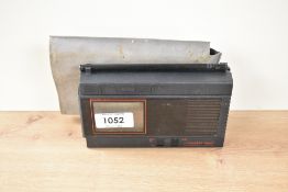 A Sinclair battery operated flat screen Pocket TV in slip case