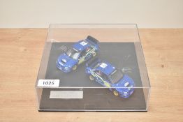 A Prodrive Limited Edition 1:43 scale Two Rally Car Die-cast set, Subaru driven by Solberg and