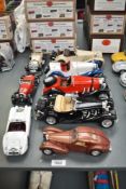 Eight Burago Die-casts, 1: 20 scale Mercedes Benz 500K Roadster in black and in cream, 1:18 scale