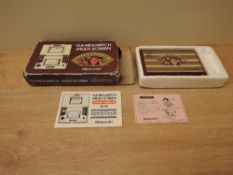 A Nintendo 1983 Game & Watch Donkey Kong II Multi Screen electronic game, model no DK-52, in