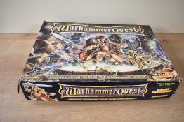 A Games Workshop 374/1809 Citadel Minatures Warhammer Quest Game, apperas unused. Box damaged