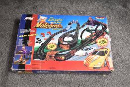 A Artin Slot Racing Set, Escape from Volcano Mountain, in original box