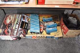 A large collection of Scalextric including Grand Prix 80 set in original box, Mighty Metro in