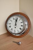 A Henry Browne & Son Ltd, Barking, London chrome bulkhead clock with enamelled dial, roman numerals,