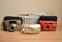 An Olympus MII Zoom 80 camera, an Olympus AF10 camera and a Minolto Vectis 40 camera