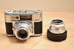 A Braun Paxette camera with Braun Katagon 1:2,8 50mm lens and a Staeble-teleson 1:5,6 85mm lens