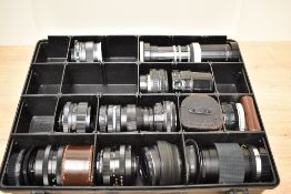 A box ov various lenses. An Ozeck 1:2,8 35mm, a Pentacon Auto 1:1,8 50mm, an Industar -50 1:3,5