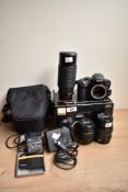 A Nikon D3300 digital camera with Nikon AF-P DX Nikkor 1:3,5-5,6G VR 18-55mm lens, and Bell & Howell