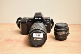 A Nikon F801 AF camera with AF Nikkor 50mm 1:1,6 lens and Nikon AF Nikkor 1:4-5,6 70-210mm lens