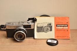 An Olympus Trip 35 camera with Olympus D Zuiko 1:2,8 40mm lens