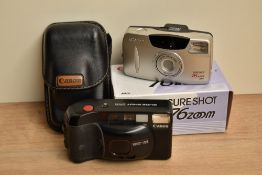 A Canon Sureshot Supreme with Canon 1:2,8 38mm lens and a Canon Sureshot 76 Zoom S AF with Canon