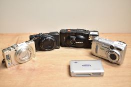 An Olympus XA2 with electronic A11 flash, a Kodak Easyshare DX6340 digital camera and 2x Nikon