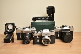 Three Zenit cameras. A Zenit - B camera with Industar 50-2 1:3,5 50mm lens and a Zenit 3M with