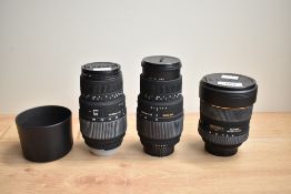 Three Sigma lenses and an Osawa lens. A Sigma 12-24mmD 1:4,5-5,6 DG HMS and a Sigma 70-300mm 1:4-5,6