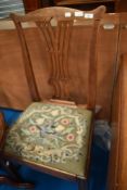 A 19th Century mahogany dining chair having drop in woolwork seat