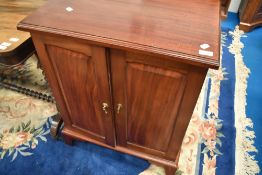 A mahogany two drawer side cabinet