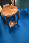 A stained frame plant stand