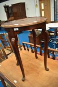 An early 20th Century mahogany occasional table having circular top and cabriole legs, diameter