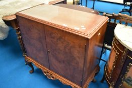 A mid 20th Century walnut Epstein style side cabinet, interior fitted for record storage