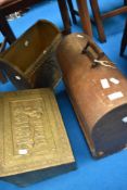 A vintage sewing machine and brass slipper box and similar magazine rack