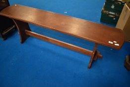 A traditional stained frame form style bench, approx 152 x 30cm